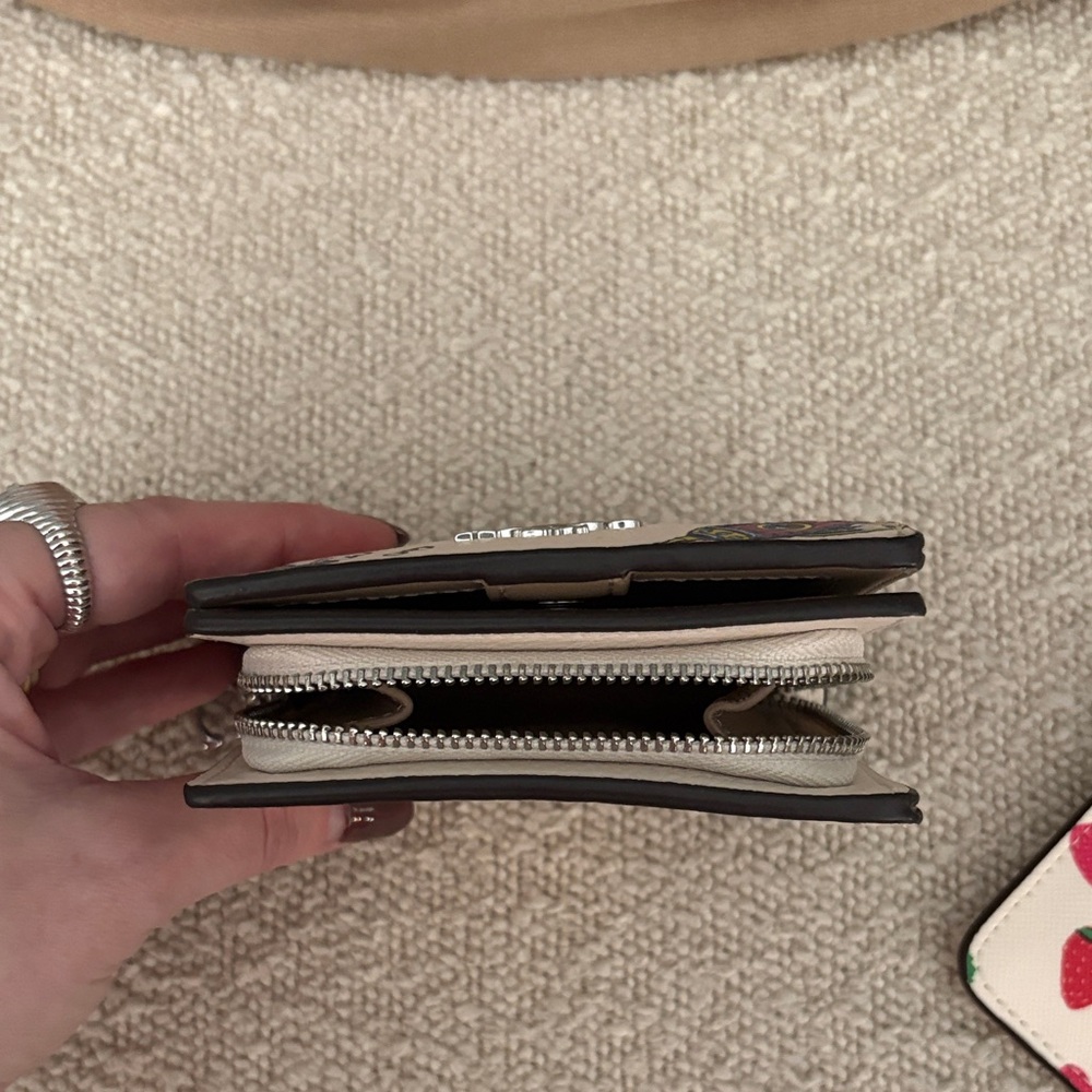 MOVING SALE 🚀 Coach Cosmic Wallet with Colorful Rocket Design
LAST DISCOUNT - Picture 6 of 7
